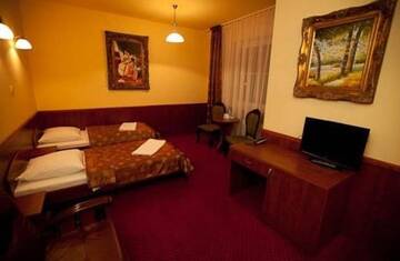 Фото номера Двухместный номер с 2 отдельными кроватями Отель Hotel Dobosz г. Полице 3